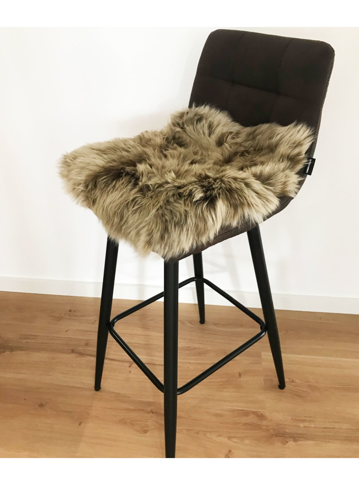 Sitzkissen und Stuhlauflage aus echtem Fell